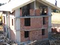 Finishing the brick work on the top floor of chalets 5 and 6.